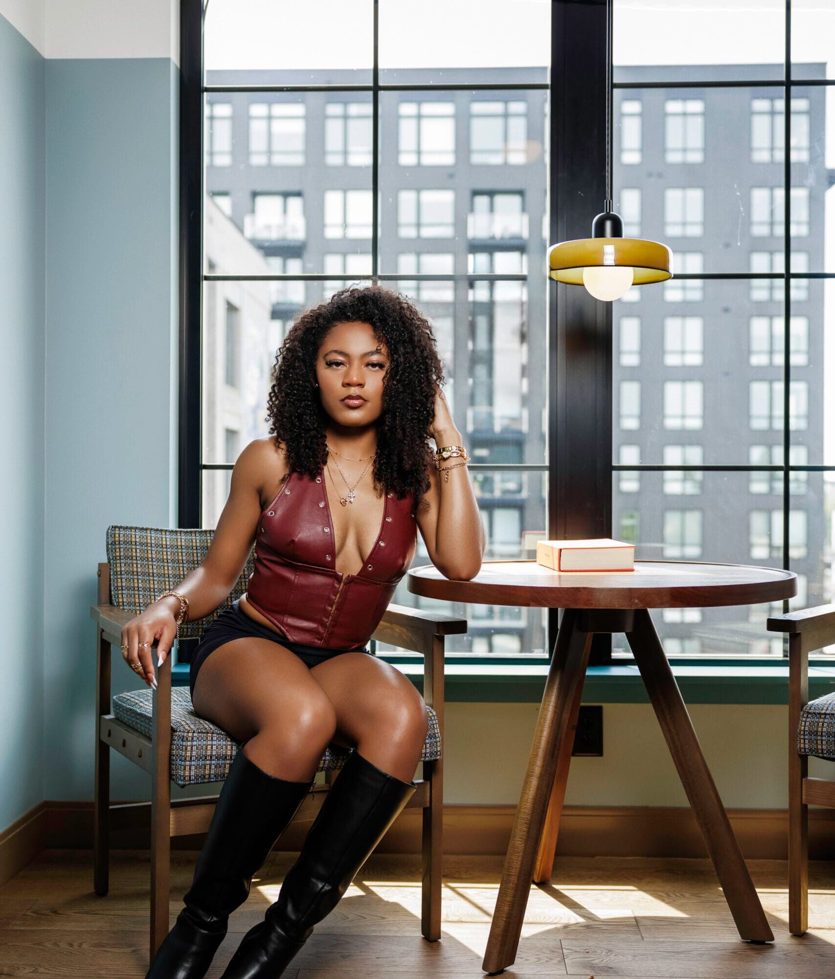 Mya Riggins lifestyle content creator sitting in editorial fashion look Columbus Ohio